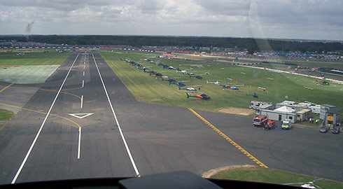 Attend race days at Silverstone, Brands Hatch, Aintree, Donnington Park etc by helicopter & fly over the conjestion!