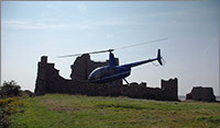 R44 taking off from Piel Island